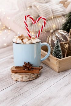 Cozy winter composition with a cup and Hot chocolate with marshmallow.