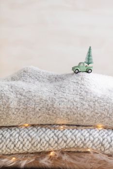 Toy car with a christmas tree, bokeh background