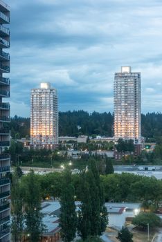 High-rise residential buildings on evening time golden hour sunset.
