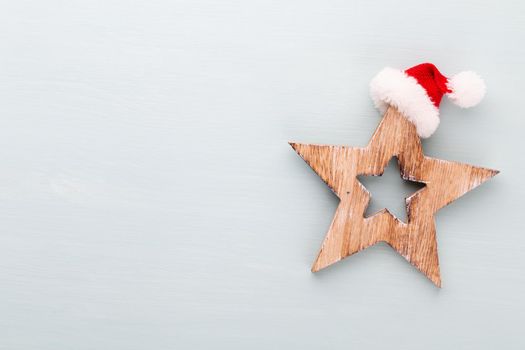 Christmas holidays composition on wooden background.
Christmas tree decoration and copy space for your text.