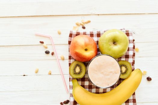 fresh fruit cocktail breakfast dessert organic wood background. High quality photo