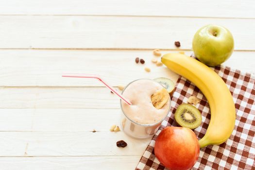 fresh fruit cocktail breakfast dessert organic wood background. High quality photo