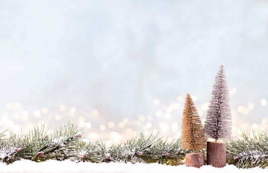 Christmas background with tree and blurred shiny lights.