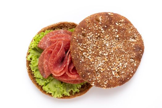 Sandwich with salami sausage on white background. 