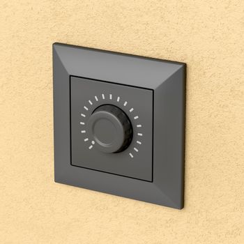 Black dimmer light switch on the wall