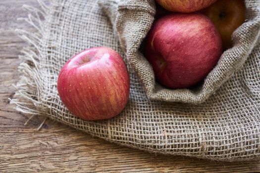 apples on a wooden table vitamins fresh fruits organic. High quality photo