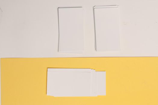 white business cards documents colorful background office copy-space. High quality photo