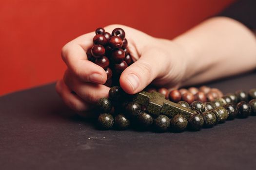 rosary beads orthodox cross close-up christianity faith the bible. High quality photo