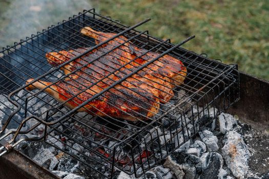 grilled chicken outdoor cooking charcoal grill nature. High quality photo