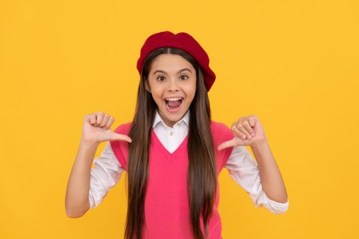 childhood happiness. back to school. cheerful kid in beret. smiling child has perfect style. teenage beauty. tween and youth. casual fashion. happy french teen girl pointing finger on herself.