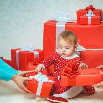 Happy little dreamy girl with christmas gift box. Happy holiday. Happy christmas. Family winter holidays and people concept. Christmas eve. Shopping sale