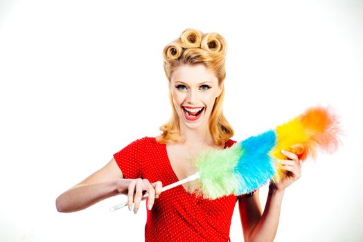 Sexy girl cleaning retro or pinup woman isolated on white. Cleaning lady with a pipidaster in the hands. Everyday life housework