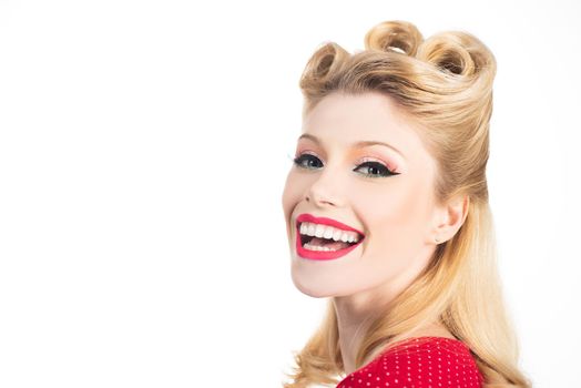 Portrait smile blond woman in pinup style. Isolated over white color background. Attractive woman in red dress retro hairdo