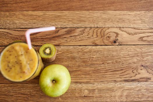 smoothie fresh fruit cocktail dessert healthy food in wooden background. High quality photo