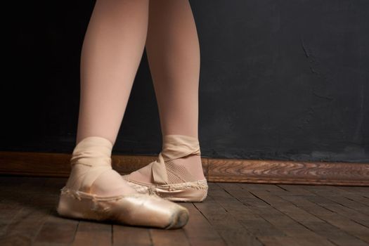 ballerina legs exercise performance classical style close-up. High quality photo