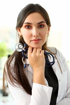 Beautiful smiling female doctor at workplace portrait. Physical and disease prevention patient aid exam visit 911 ward round prescribe remedy healthy lifestyle consultant profession concept