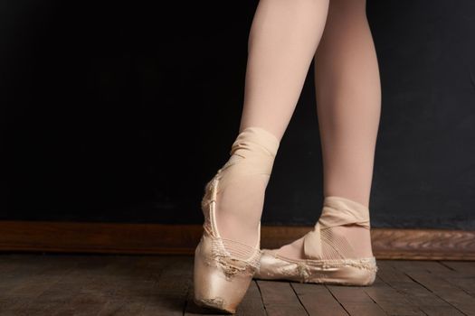 ballerina legs exercise performance classical style close-up. High quality photo