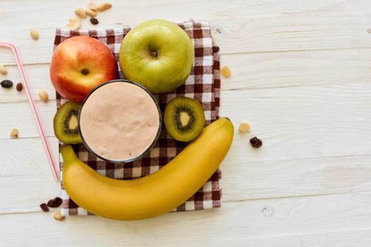 fresh fruit cocktail breakfast dessert organic wood background. High quality photo