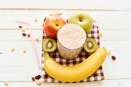 fresh fruit cocktail breakfast dessert organic wood background. High quality photo