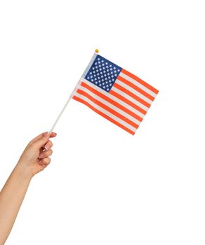 Female hand holding american flag on white background. High quality photo