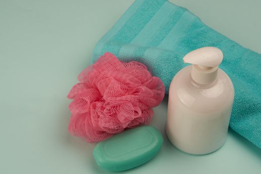 soap hygiene body care bathroom supplies green background. High quality photo