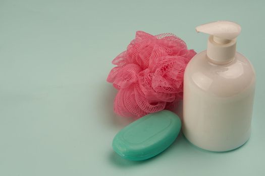 soap hygiene body care bathroom supplies green background. High quality photo