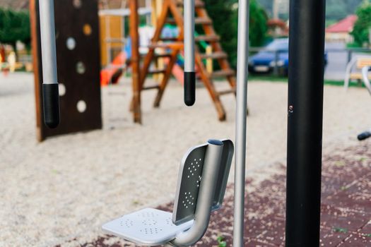 Exercise tools in a public park. Family and relax time on holiday concept.