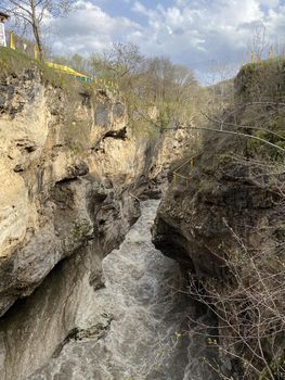 Close up of impressive canyon in spring season. Narrow deep river valley in mountainous terrain