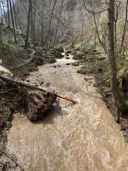 Beautiful landscape of mountain river in amazing and mysterious nature. Mountain waterway flowing through mountainous terrain