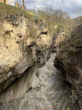 Close up of impressive canyon in spring season. Narrow deep river valley in mountainous terrain