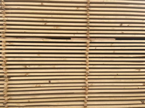 Close up of wooden boards. Texture of industrial natural timber building materials on building site