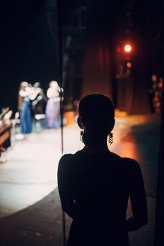 Backstage, awaiting of entering the stage