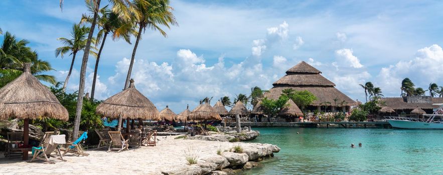 Cancun, Mexico - September 13, 2021: Lagoon at XCaret park on Mayan Riviera resort. XCaret is a famous ecotourism park on the mexican Mayan Riviera