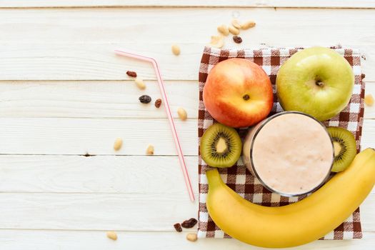 fresh fruit cocktail breakfast dessert organic wood background. High quality photo