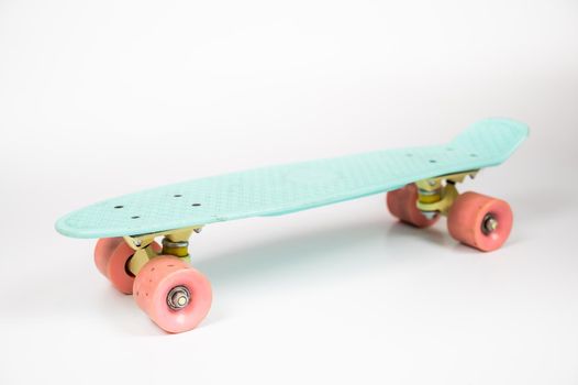 Blue penny board on a white background. isolate
