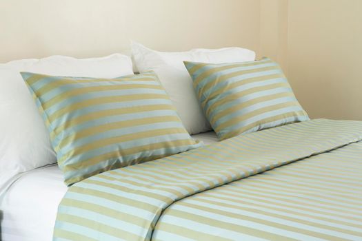 Comfortable soft pillows on the bed