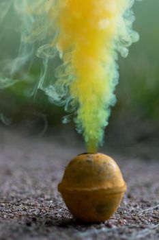 Vibrant colorful display of yellow smoke bombs celebrating independence day with textured background 4th of July . Shows artistic use of color and design. . High quality photo