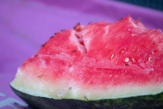 Close up of watermelon with ants on it . High quality photo