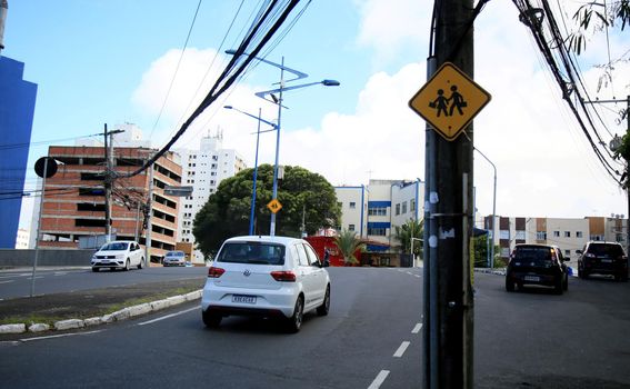 salvador, bahia, brazil - july 20, 2021: traffic sign indicating pedestrian crossing in a school area in the city of Salvador.