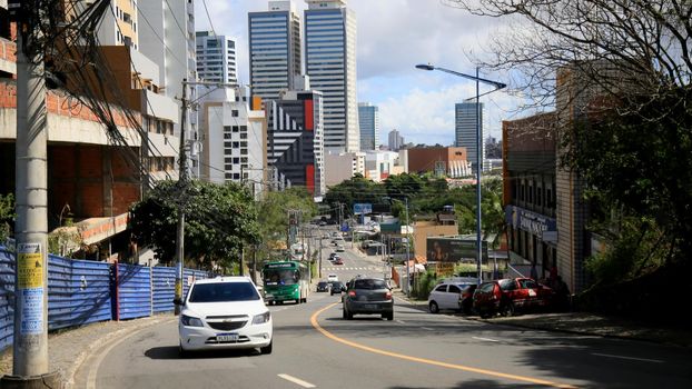 salvador, bahia, brazil - july 20, 2021: movement of vehicles on a slope in the neighborhood of Stiep in the city of Salvador.