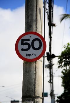 salvador, bahia, brazil - july 20, 2021:traffic sign indicating the limit of 50 kilometers per hour in the city of Salvador.