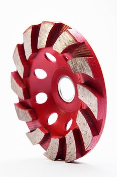 Red grinding wheel on white background