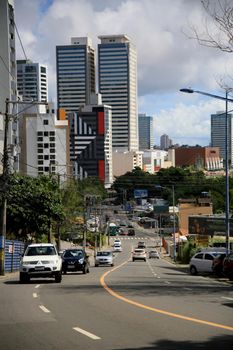 salvador, bahia, brazil - july 20, 2021: movement of vehicles on a slope in the neighborhood of Stiep in the city of Salvador.