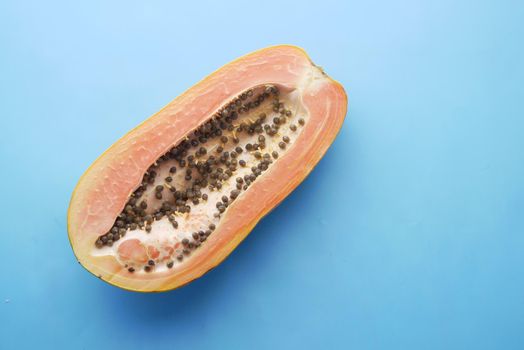 slice of papaya on white plate