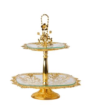 Oriental golden cake stand isolated on white background, close up
