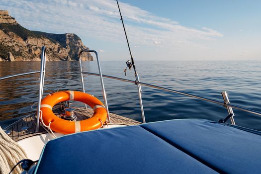 Lifebuoy saver ring on sailboat in the open sea