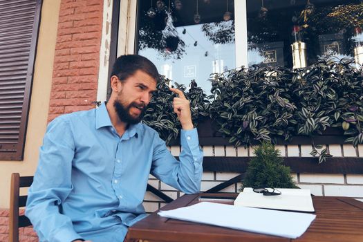 manager in a cafe work paper documents. High quality photo