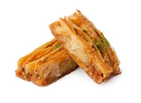 Close up photo of Turkish dessert baklava isolated on white