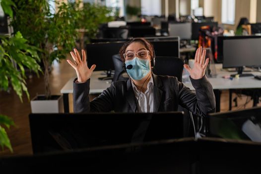 Business woman in protective mask screams in panic