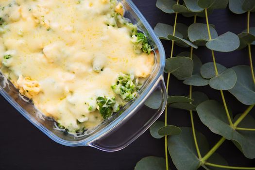 casserole with broccoli, cheese and cream, close-up